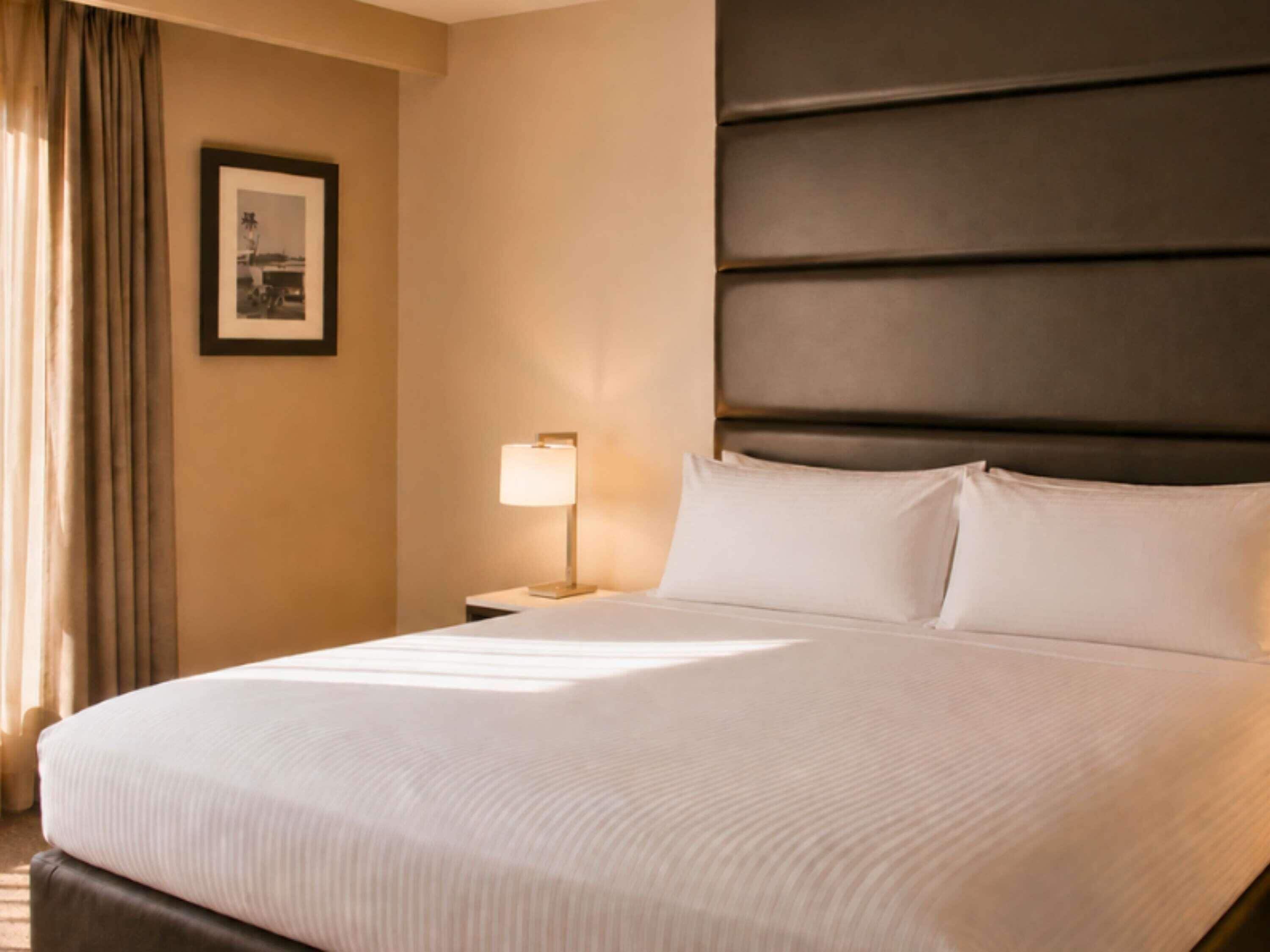 Deluxe Suite, 1 King Bed | Minibar, in-room safe, desk, blackout curtains