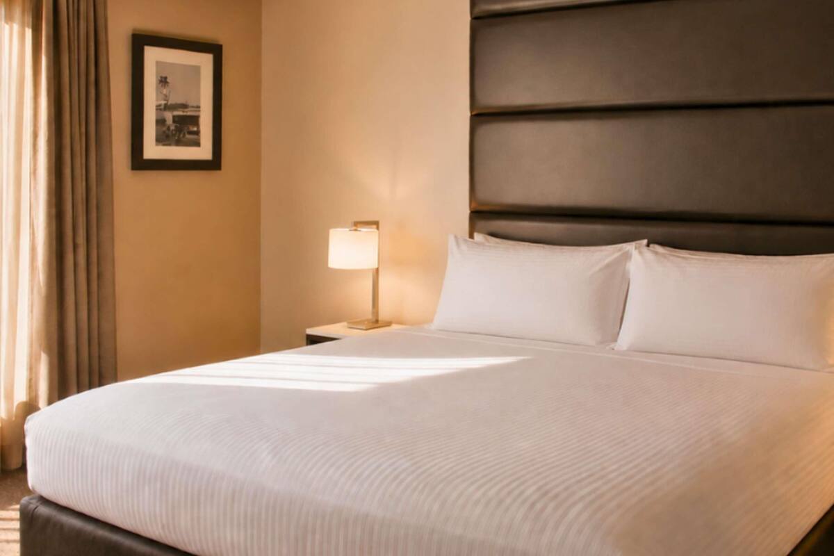 Deluxe Suite, 1 King Bed | Minibar, in-room safe, desk, blackout curtains
