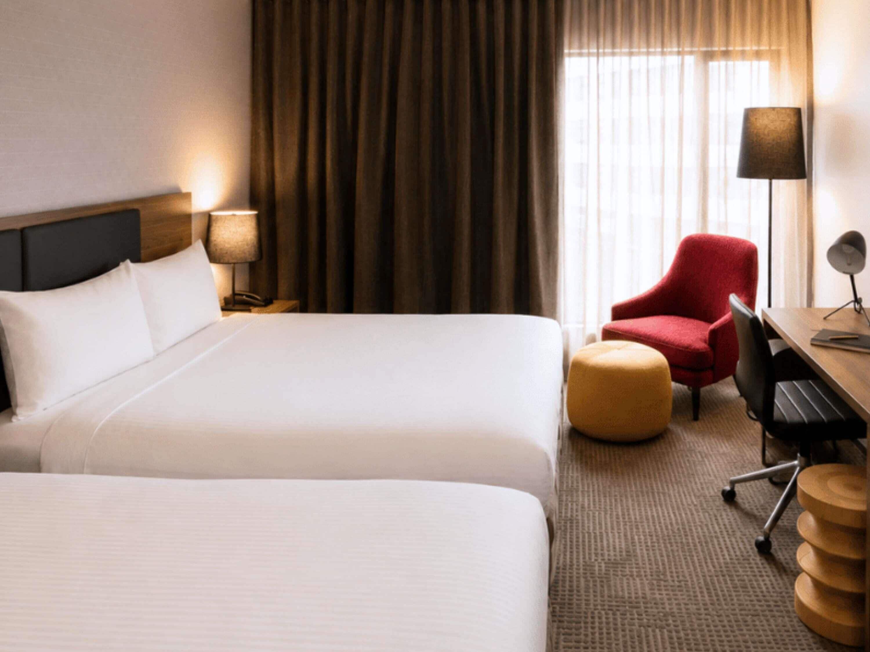 Deluxe Room, 2 Queen Beds | Minibar, in-room safe, desk, blackout curtains