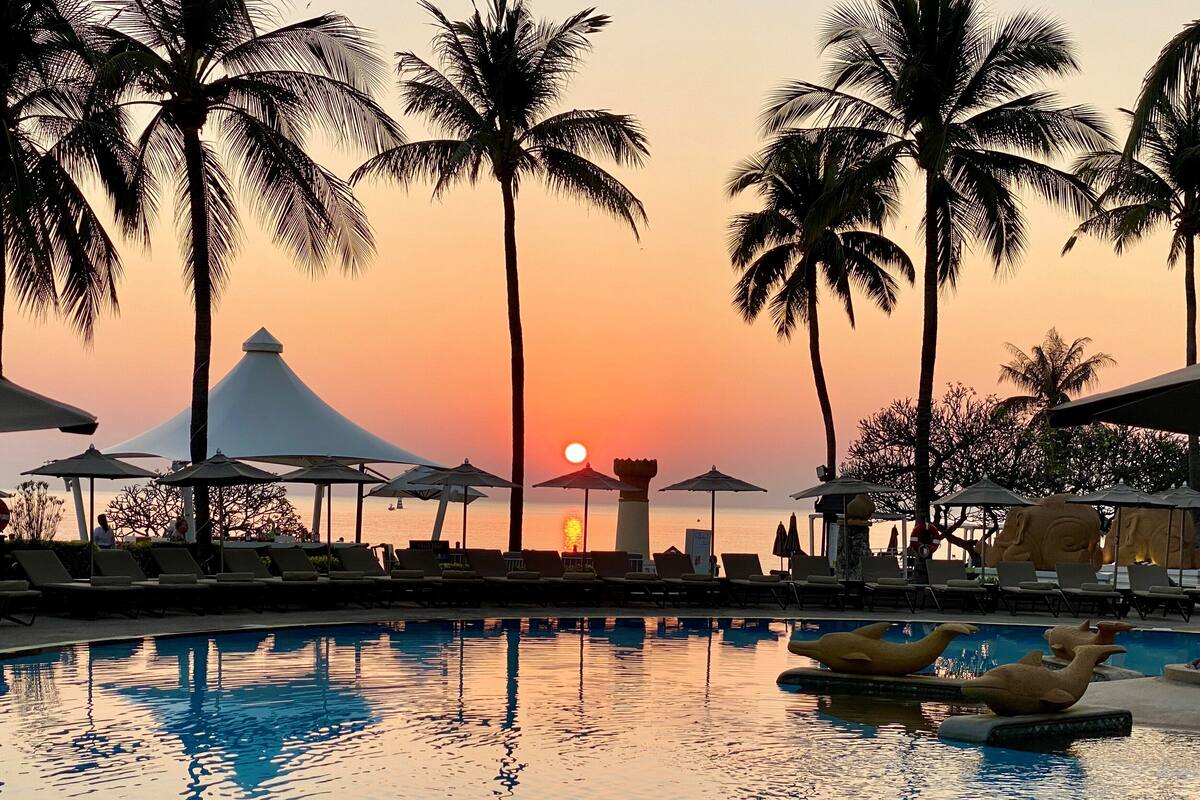 outdoor pool, open 7:00 am to 7:00 pm, pool umbrellas, pool loungers