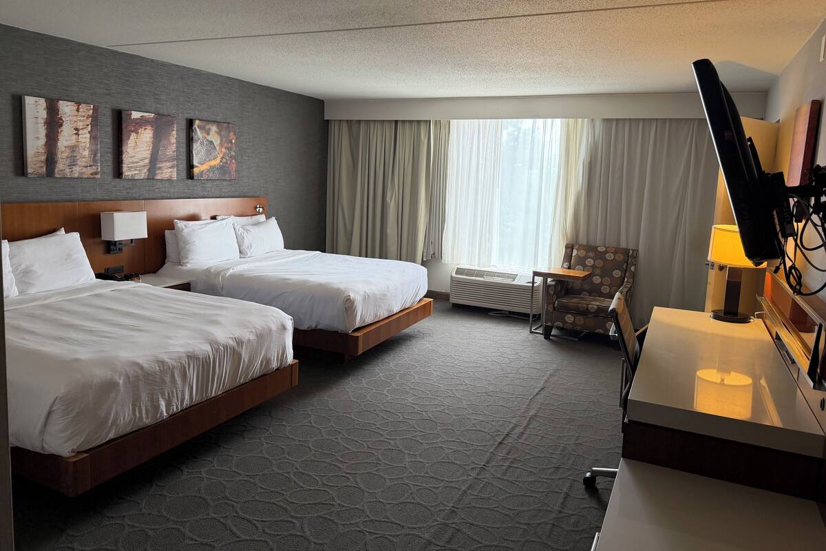 Standard Room, Multiple Beds, Non Smoking | In-room safe, desk, laptop workspace, blackout curtains