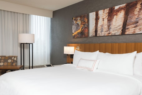 In-room safe, individually decorated, individually furnished, desk. The Center Hotel Grand Rapids Airport