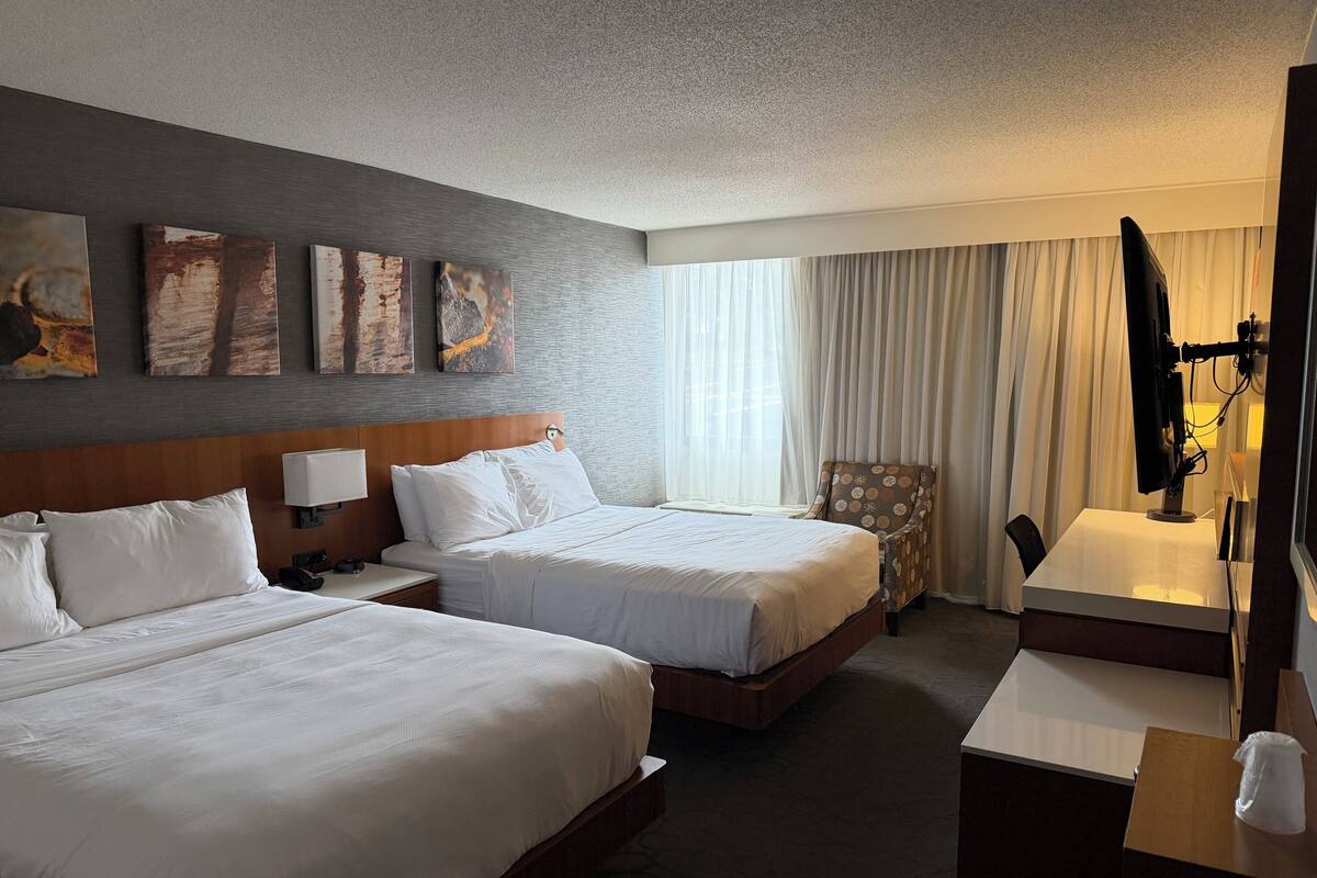 Suite, Multiple Beds, Non Smoking | In-room safe, desk, laptop workspace, blackout curtains