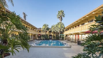 Outdoor pool, pool umbrellas, sun loungers