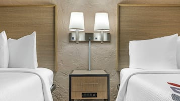 Premium bedding, desk, laptop workspace, blackout curtains
