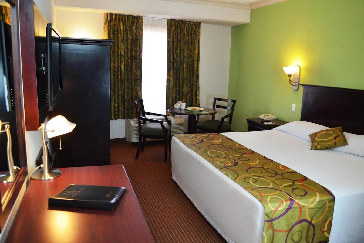 Hypo-allergenic bedding, in-room safe, desk, laptop workspace