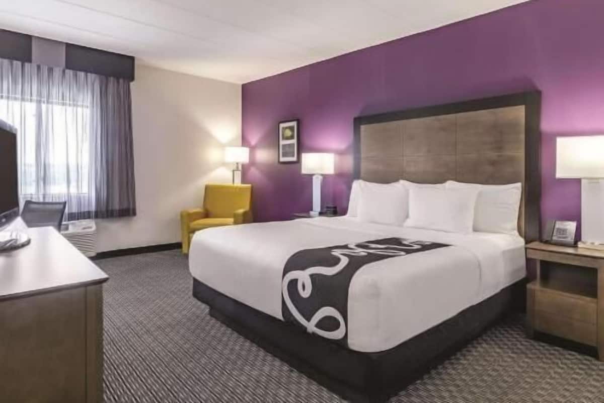 Premium bedding, desk, blackout drapes, iron/ironing board