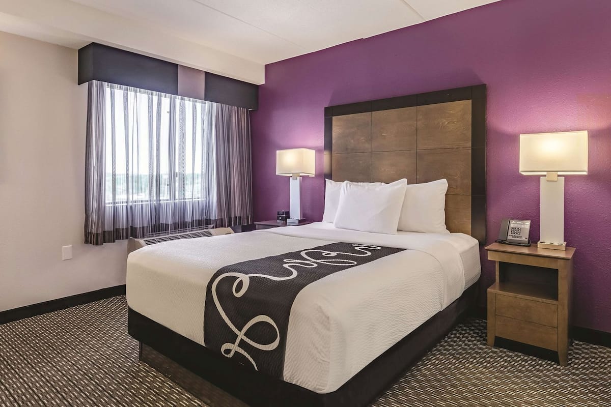 Premium bedding, desk, blackout drapes, iron/ironing board