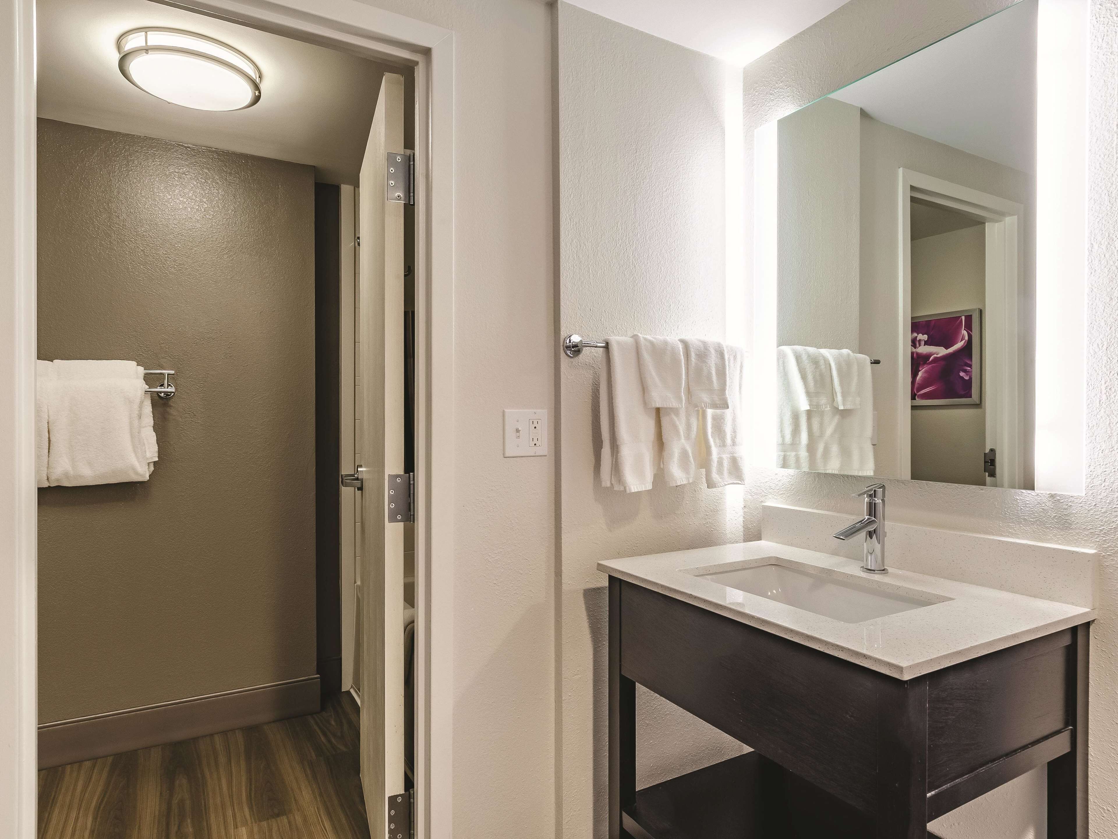 suite, 1 king bed, non smoking | premium bedding, desk, blackout curtains, iron/ironing board