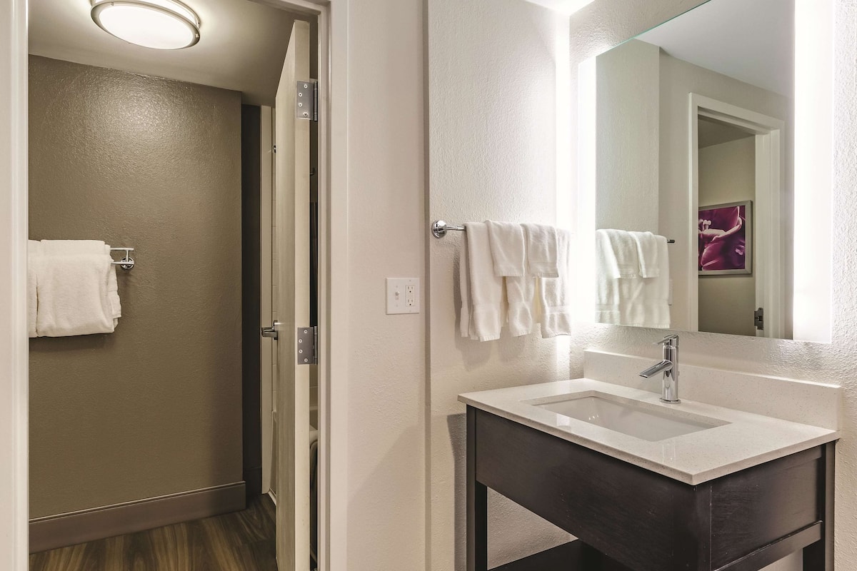 suite, 1 king bed, non smoking | premium bedding, desk, blackout curtains, iron/ironing board