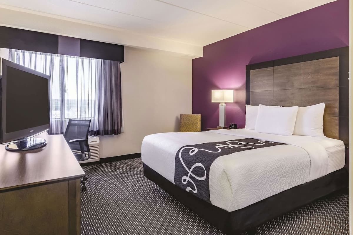 Premium bedding, desk, blackout drapes, iron/ironing board
