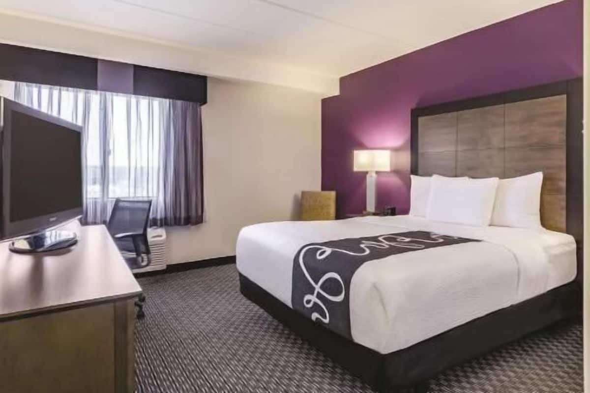 Premium bedding, desk, blackout drapes, iron/ironing board