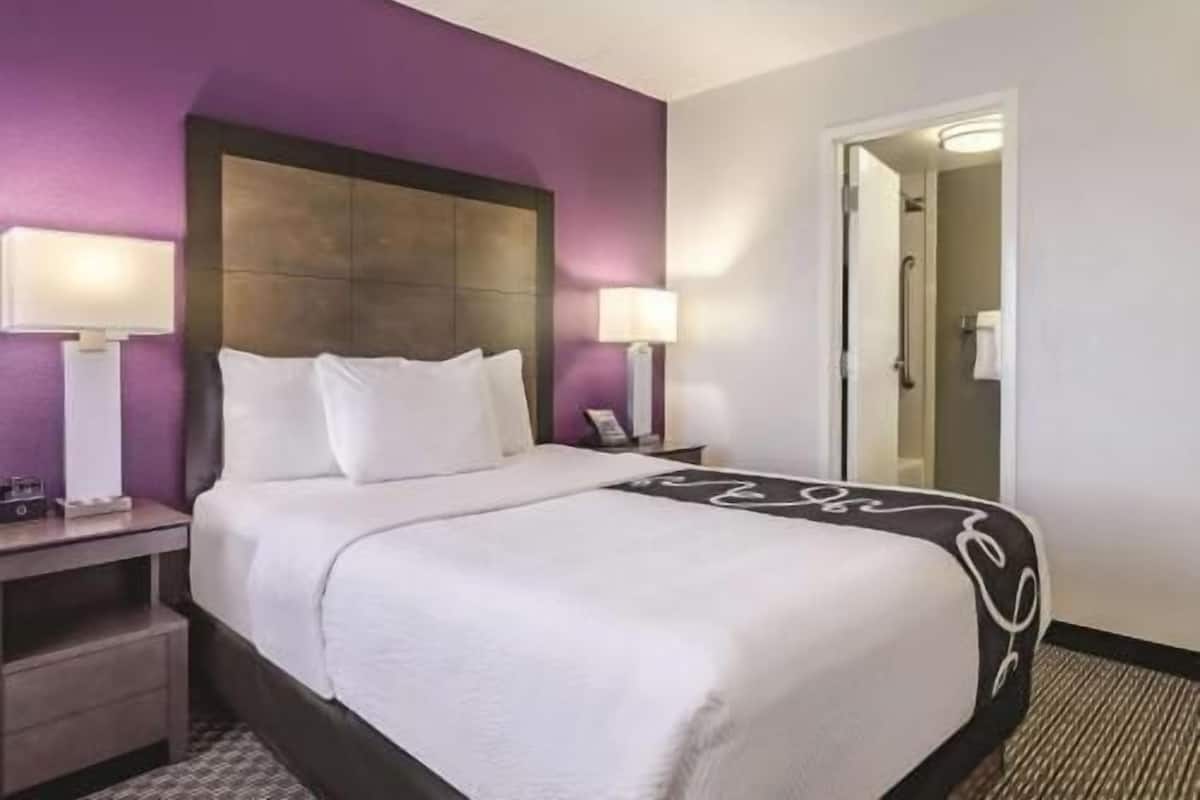 Premium bedding, desk, blackout drapes, iron/ironing board