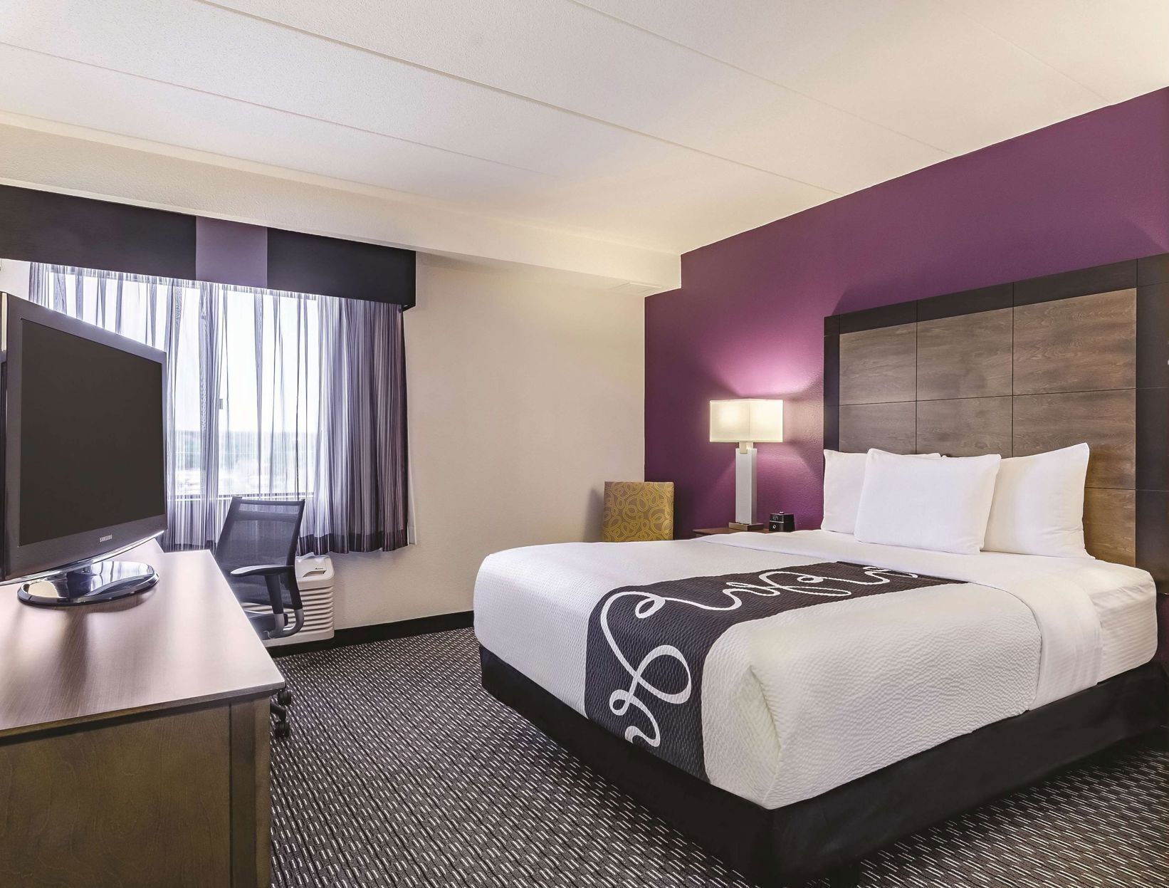 Premium bedding, desk, blackout drapes, iron/ironing board