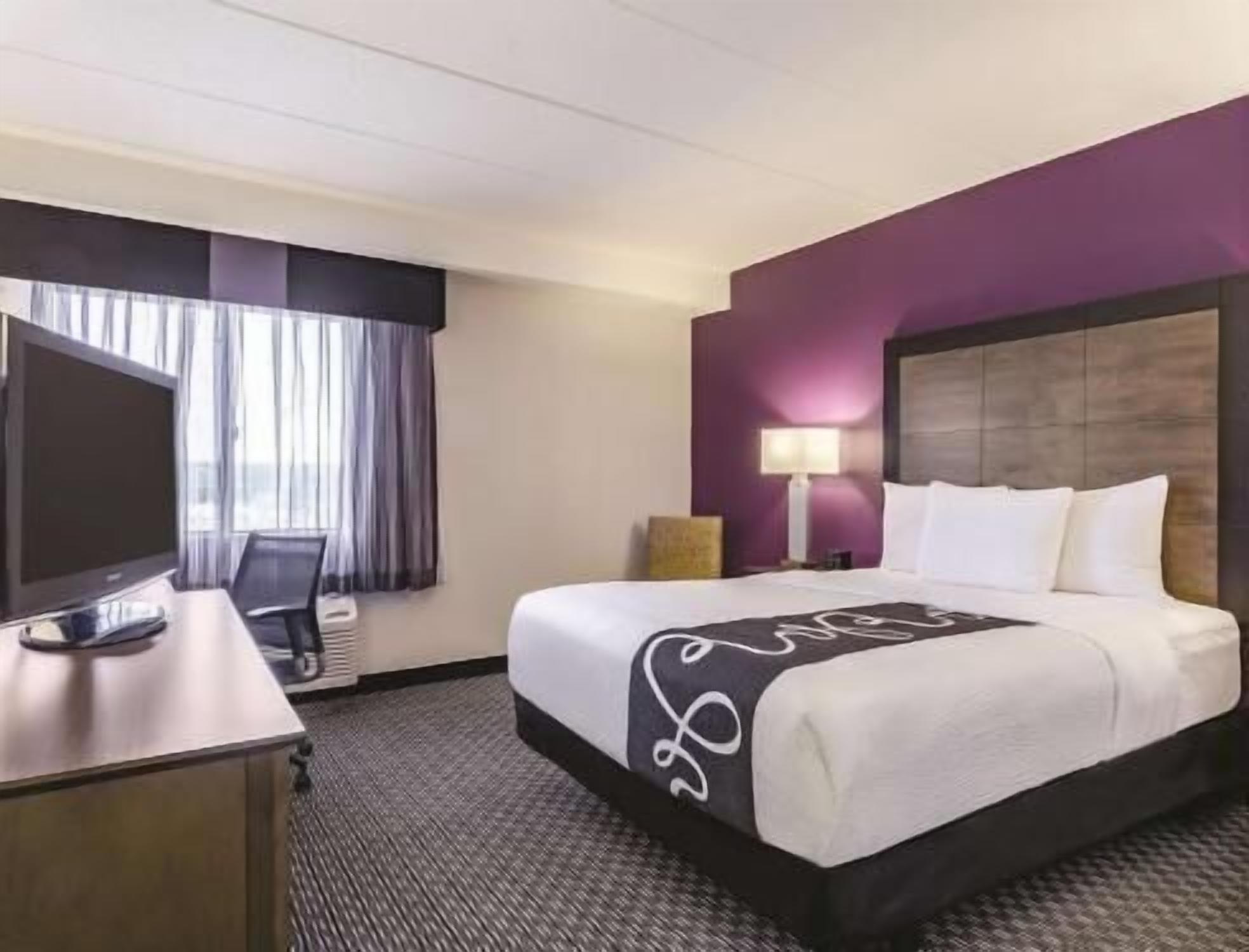 Premium bedding, desk, blackout drapes, iron/ironing board