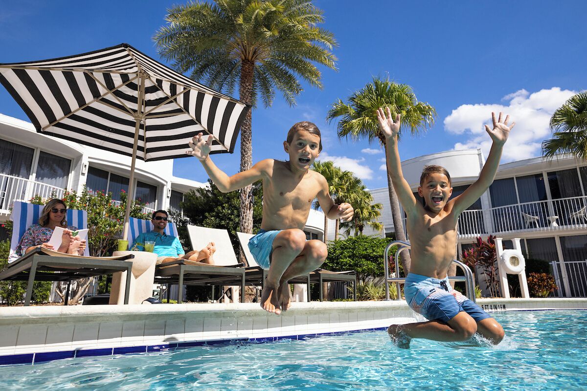 Outdoor pool, open 7:00 AM to 11:00 PM, pool umbrellas, pool loungers