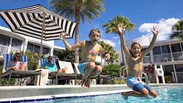 Outdoor pool, open 7:00 AM to 11:00 PM, pool umbrellas, pool loungers