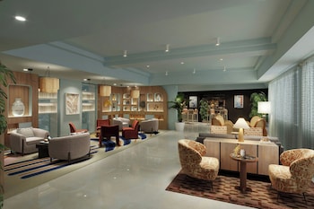 Hotel entrance and lobby at Renaissance Orlando Resort – Disney Springs® Area