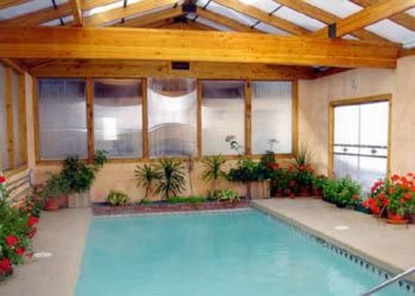 Indoor pool, open 8:30 AM to 9:30 PM, pool loungers