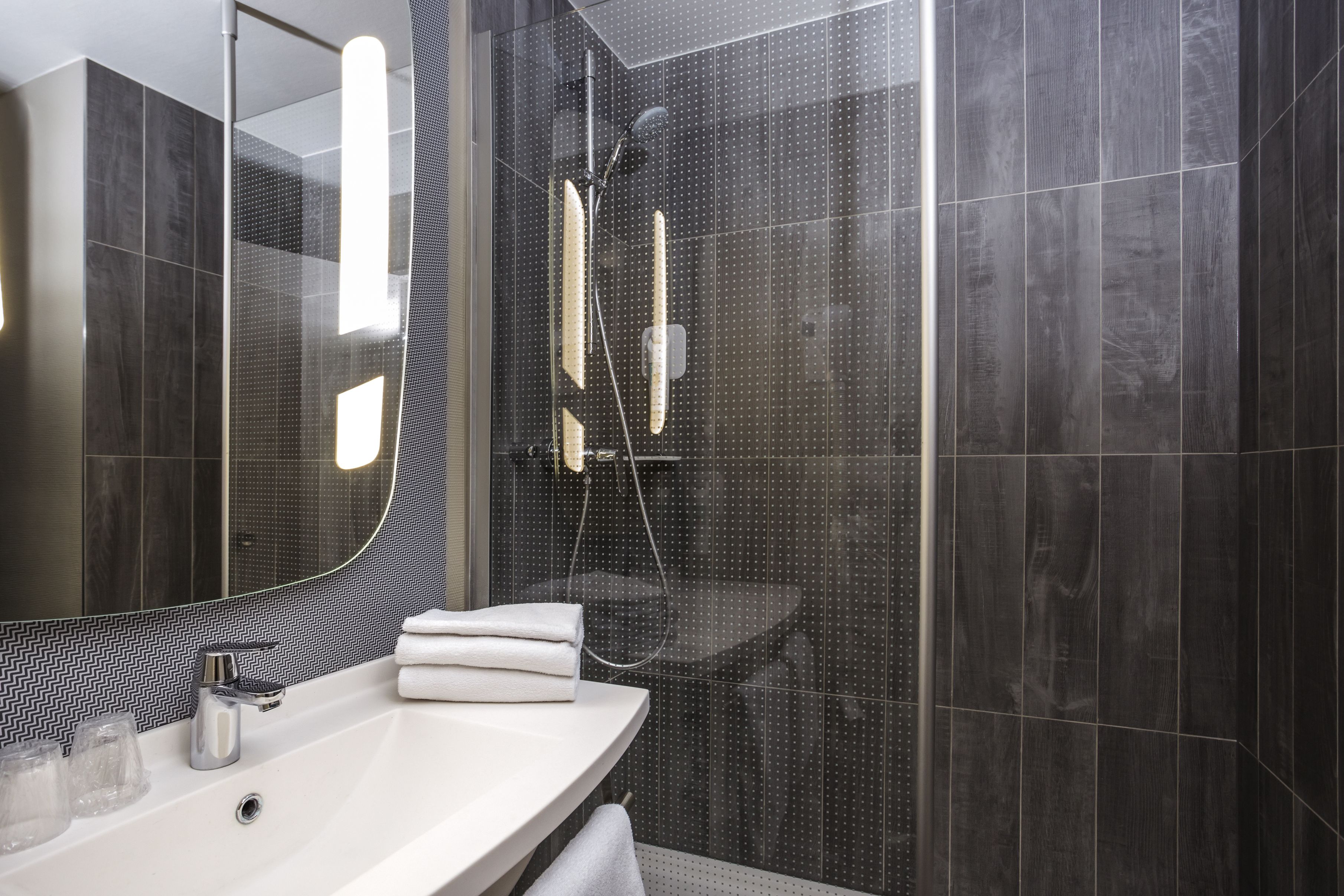 eco-friendly toiletries, hair dryer, towels