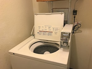Convenient laundry facilities are available with a coin-operated washing machine.