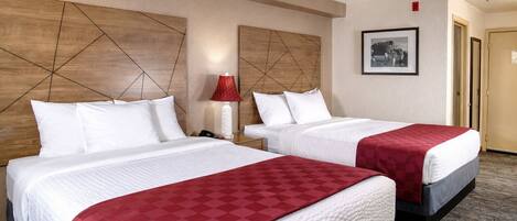 Desk, blackout drapes, iron/ironing board, free cribs/infant beds