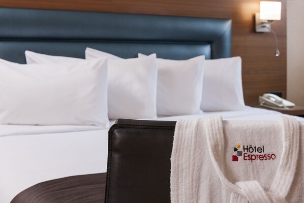 Premium bedding, desk, iron/ironing board, rollaway beds