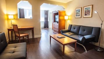 Junior Suite, 1 Bedroom | Living area | 40-inch LED TV with cable channels, TV