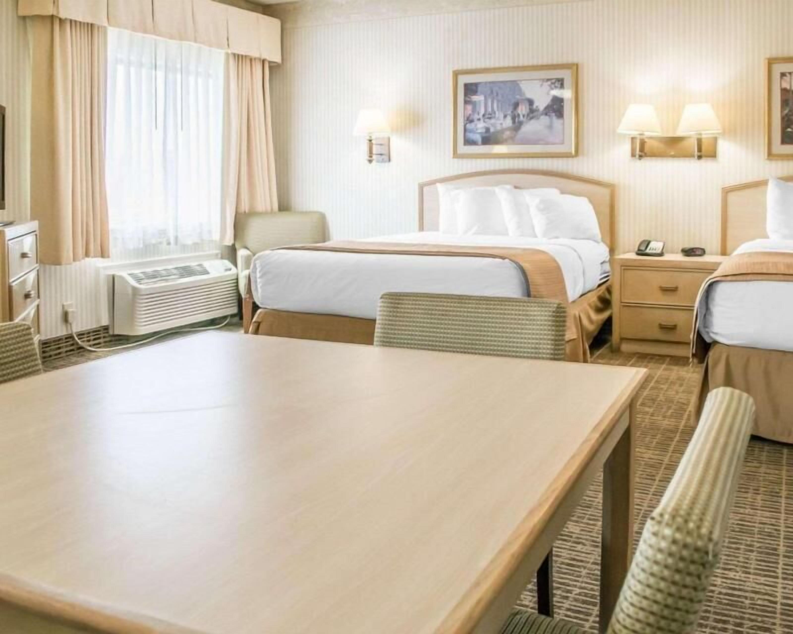 Premium bedding, pillow-top beds, desk, iron/ironing board