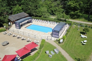 Indoor pool, seasonal outdoor pool, pool umbrellas, sun loungers