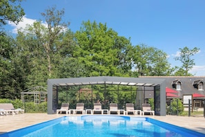 Indoor pool, seasonal outdoor pool, pool umbrellas, pool loungers