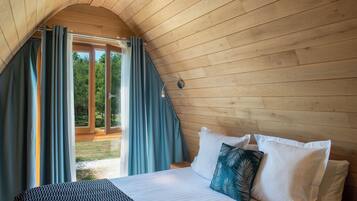 Cabaña Deluxe | Ropa de cama de alta calidad y minibar