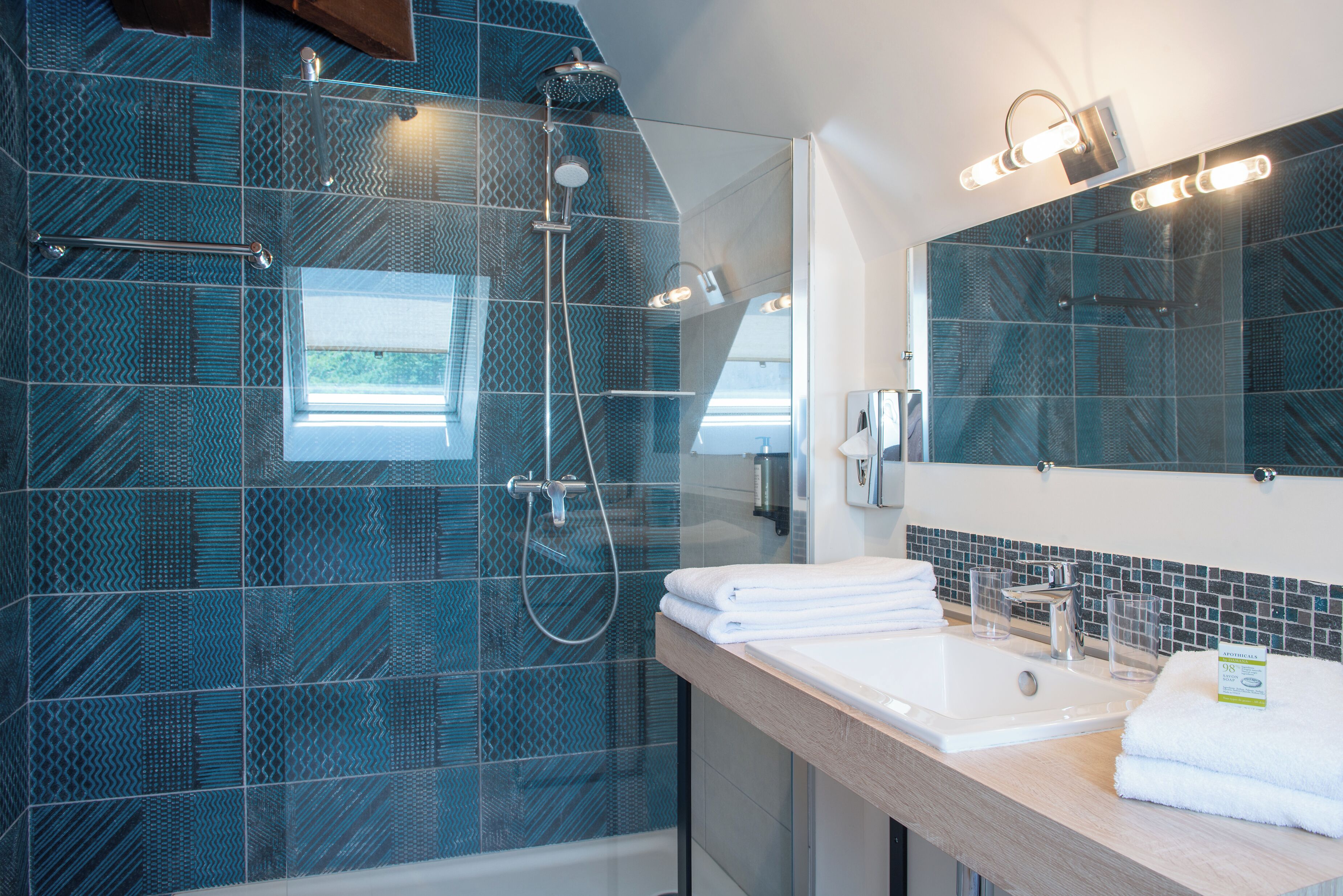 rainfall showerhead, eco-friendly toiletries, hair dryer, bathrobes