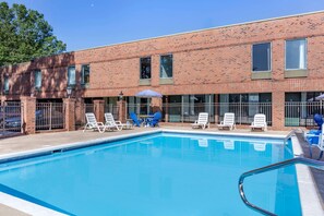 Seasonal outdoor pool, open 11:00 AM to 9 PM, sun loungers - Days Inn & Suites by Wyndham Rocky Mount Golden East (Rocky Mount)