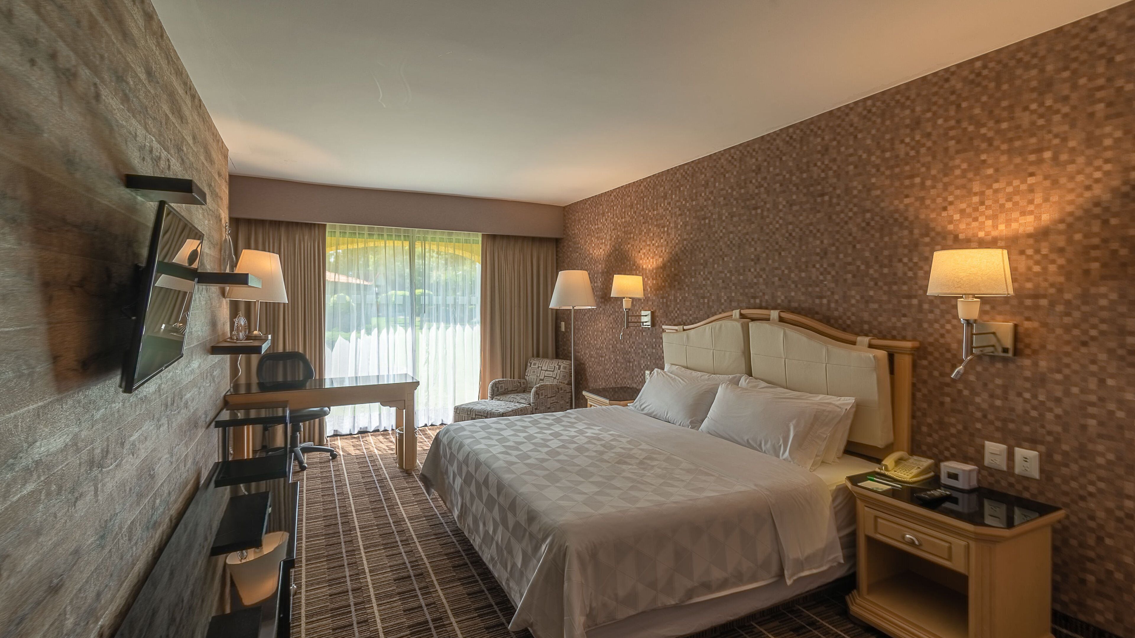 Ropa de cama de alta calidad y minibar 