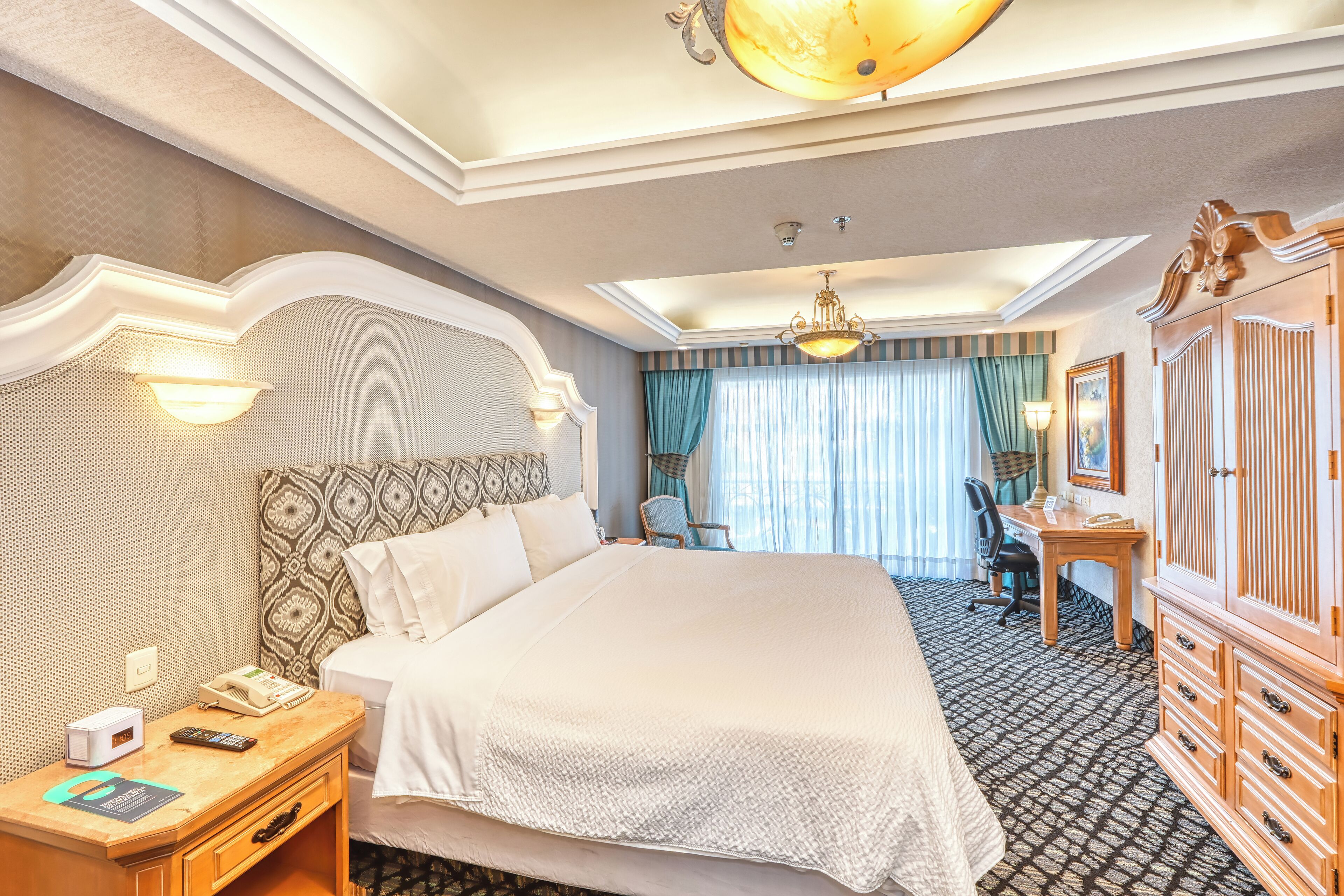 Premium Room, 1 King Bed | Premium bedding, minibar, in-room safe, individually decorated