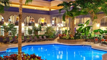 Indoor pool, a heated pool, open 7:00 AM to 10:00 PM, pool loungers