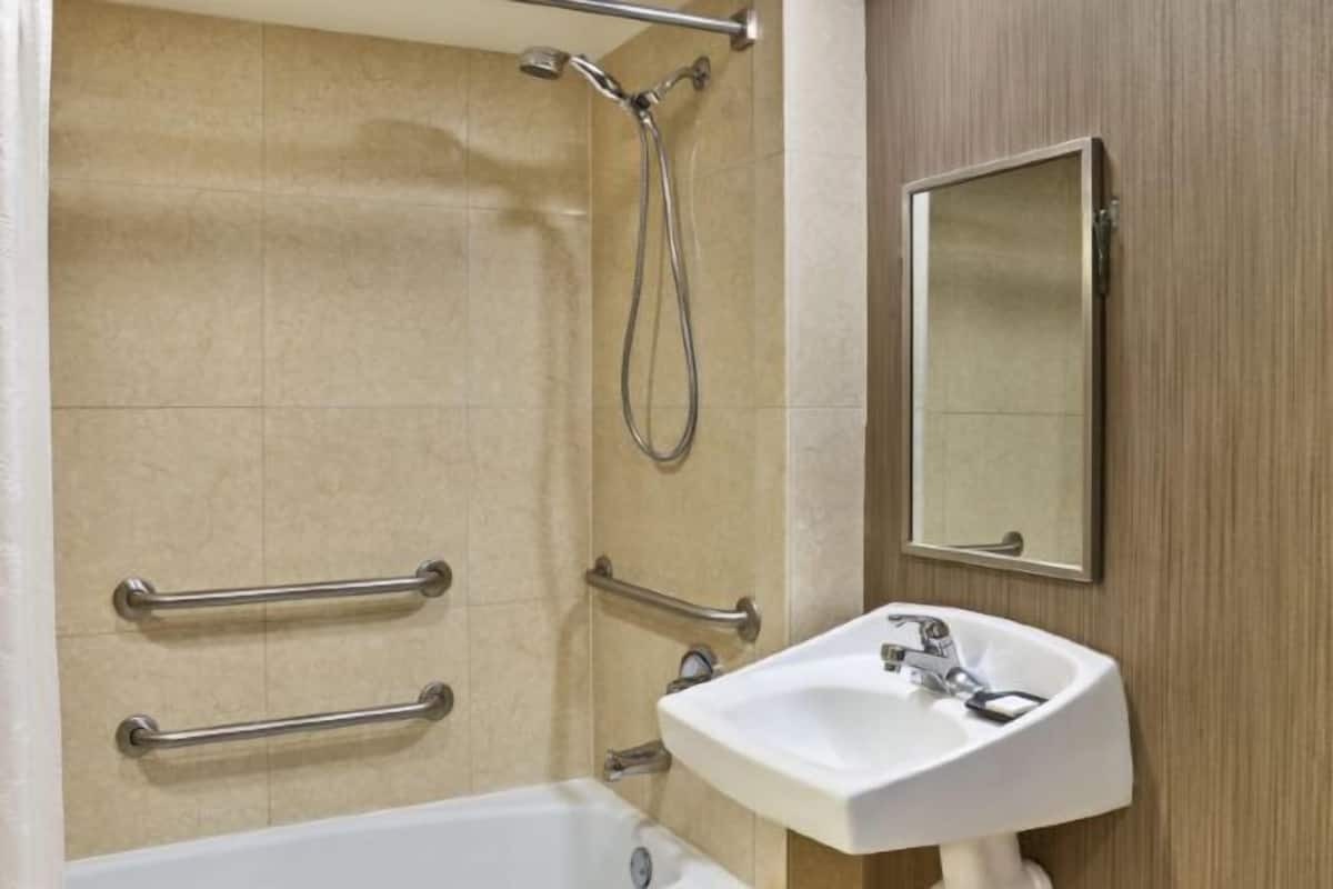 Designer toiletries, hair dryer, bathrobes, towels