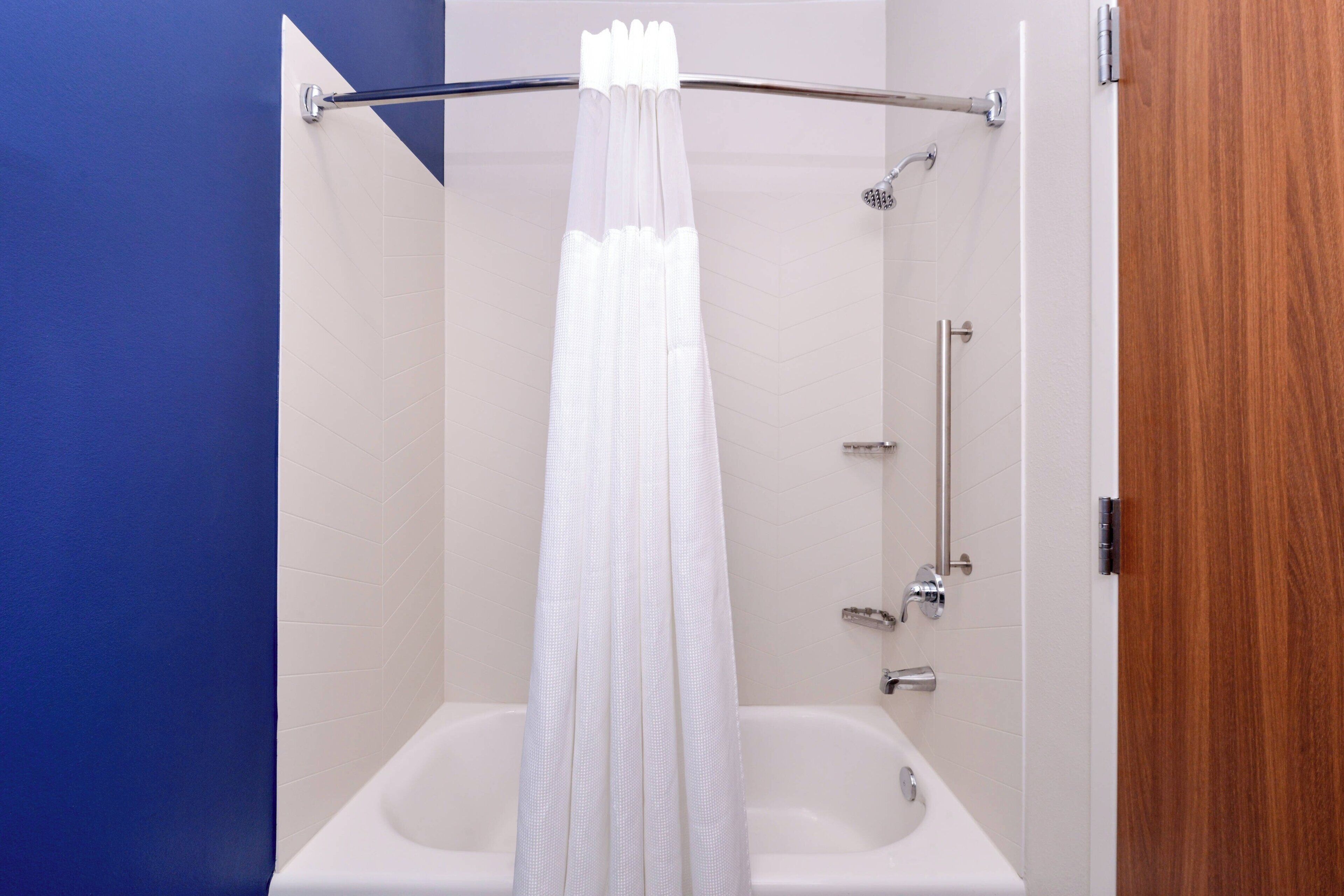 room, 2 queen beds | bathroom | shower, eco-friendly toiletries, hair dryer, towels