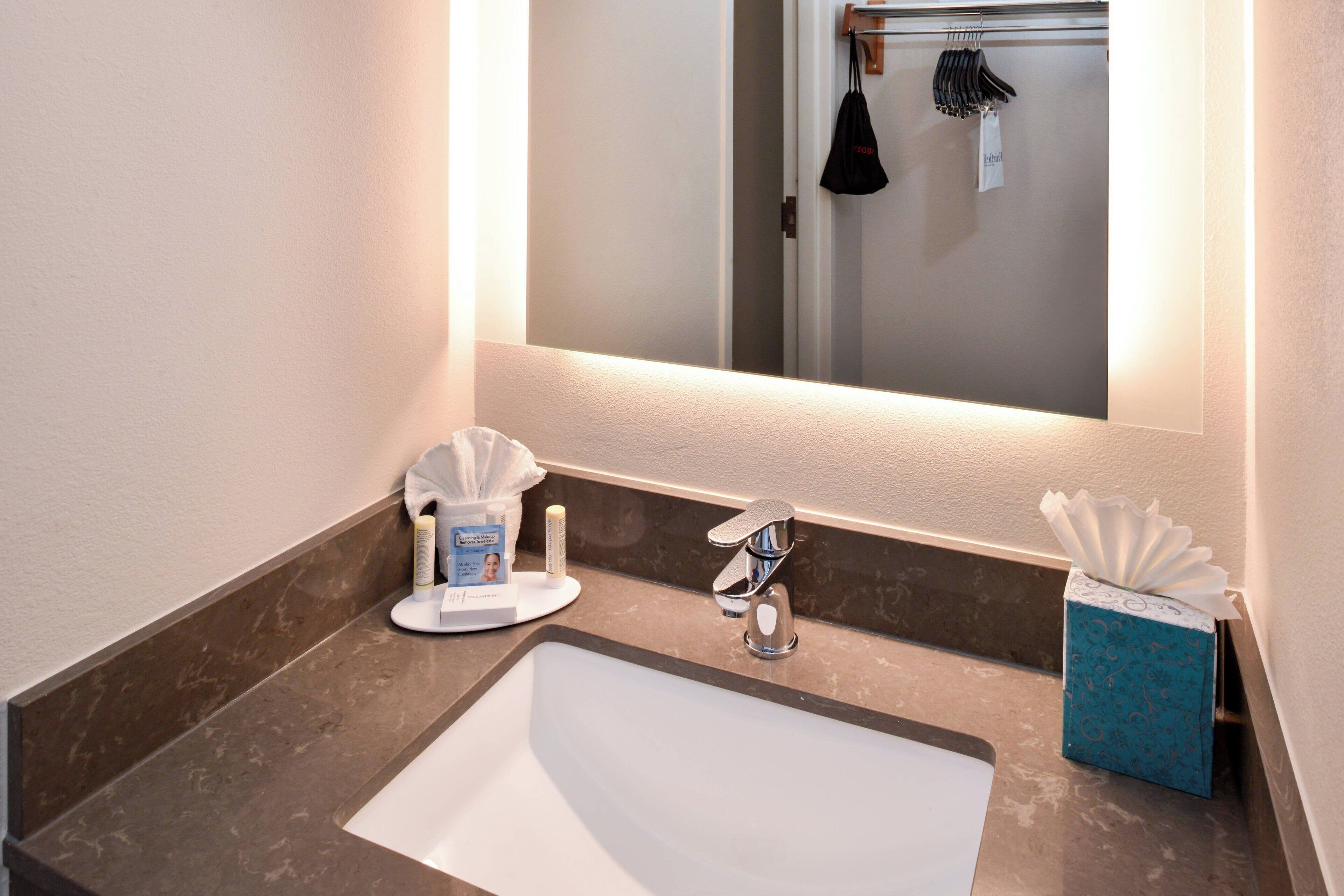 room, 2 queen beds | bathroom | shower, eco-friendly toiletries, hair dryer, towels