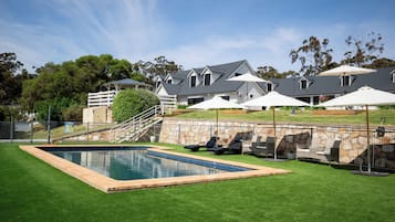 Outdoor pool, pool umbrellas, pool loungers