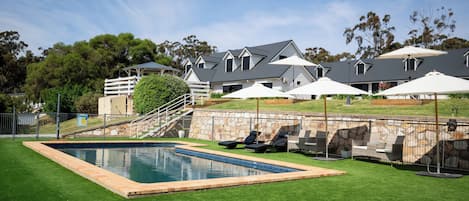 Outdoor pool, pool umbrellas, sun loungers