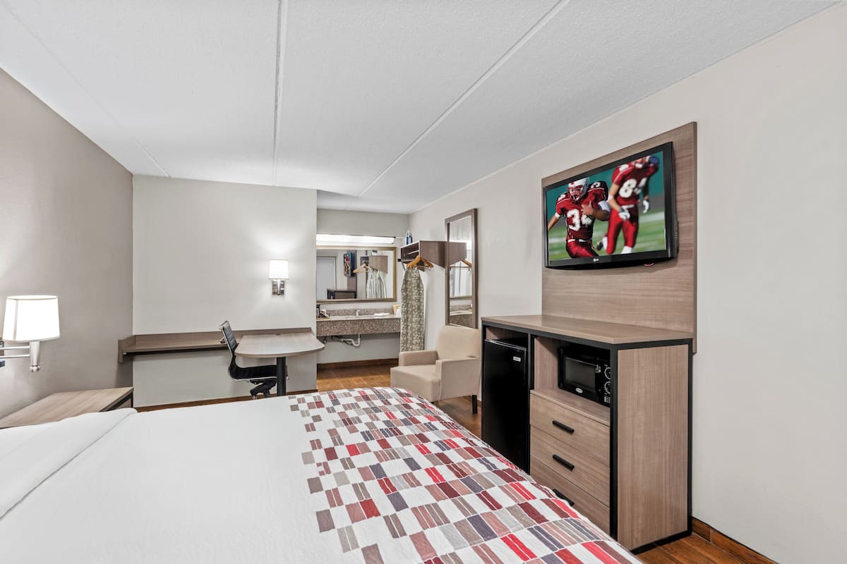 Blackout drapes, iron/ironing board, cribs (free), WiFi (free)