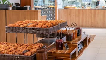 Daily buffet breakfast (EUR 23 per person)