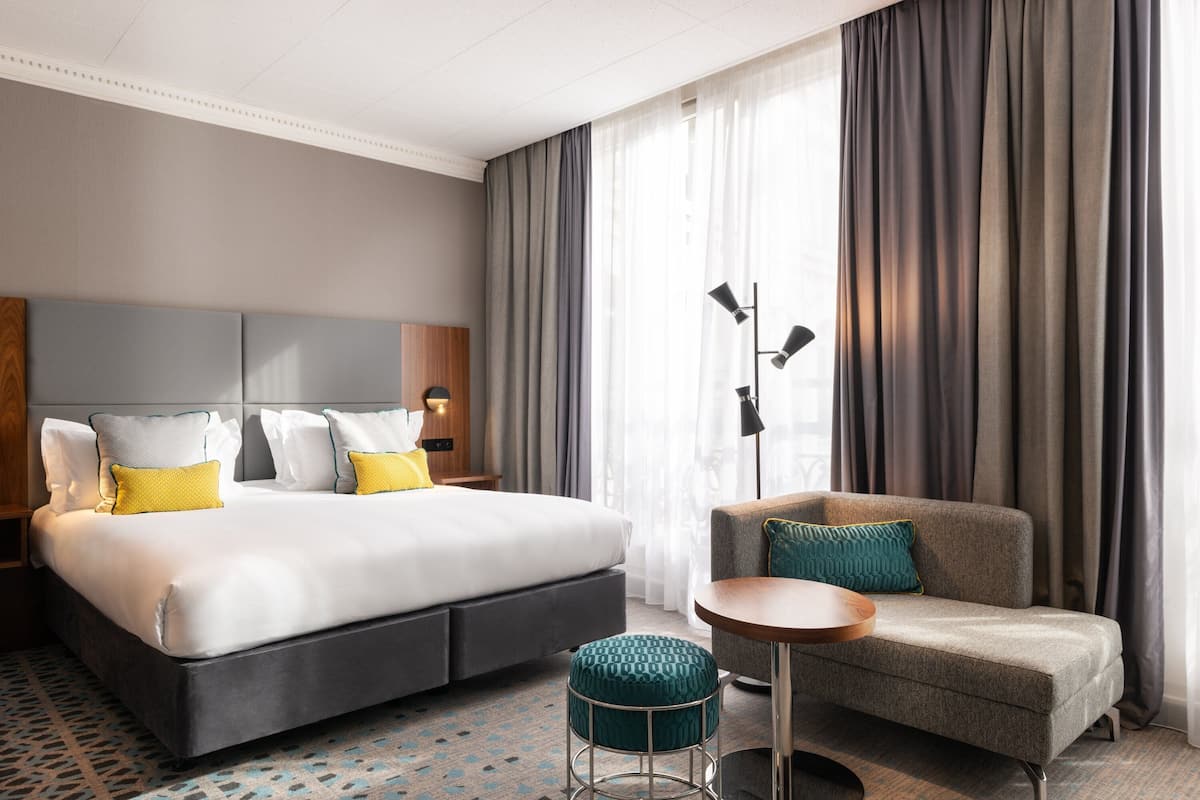 Premium Room, 1 King Bed | Premium bedding, minibar, in-room safe, individually decorated