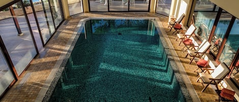 Indoor pool, outdoor pool, open 8:00 AM to 7:00 PM, pool umbrellas