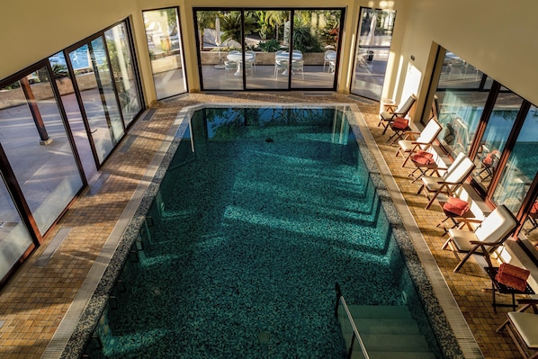 Indoor pool, outdoor pool, open 8:00 AM to 7:00 PM, pool umbrellas