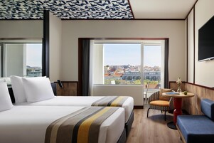 Minibar, desk, blackout drapes, bed sheets