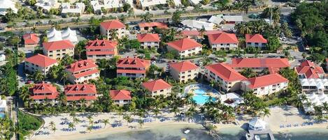 On the beach, sun-loungers, beach umbrellas, beach towels