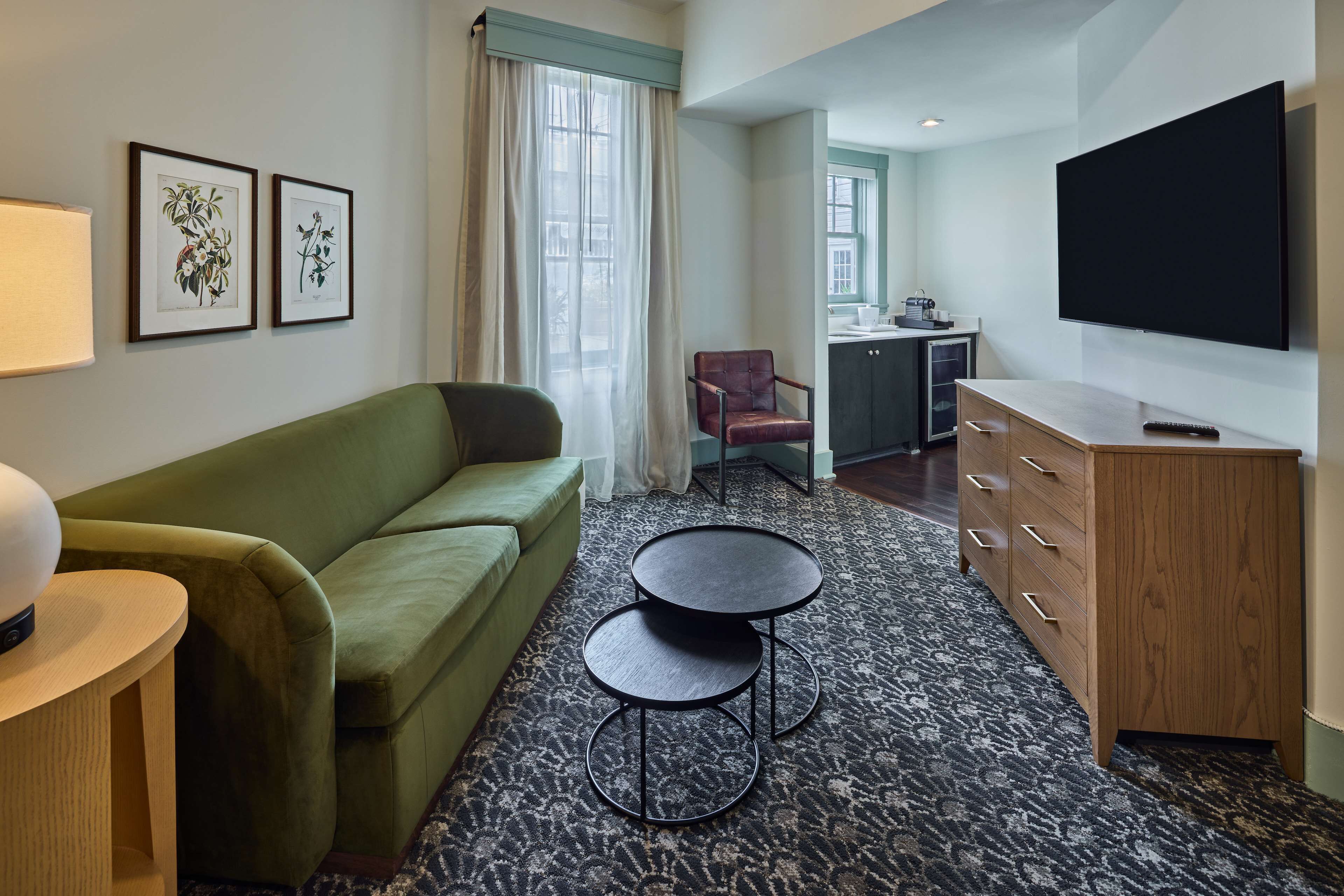 suite, 1 queen bed | living area | tv, mp3 dock